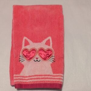 Fun Pink Cotton Cat Hand Towel with Heart Glasses & a Heart Balloon on it's Tail